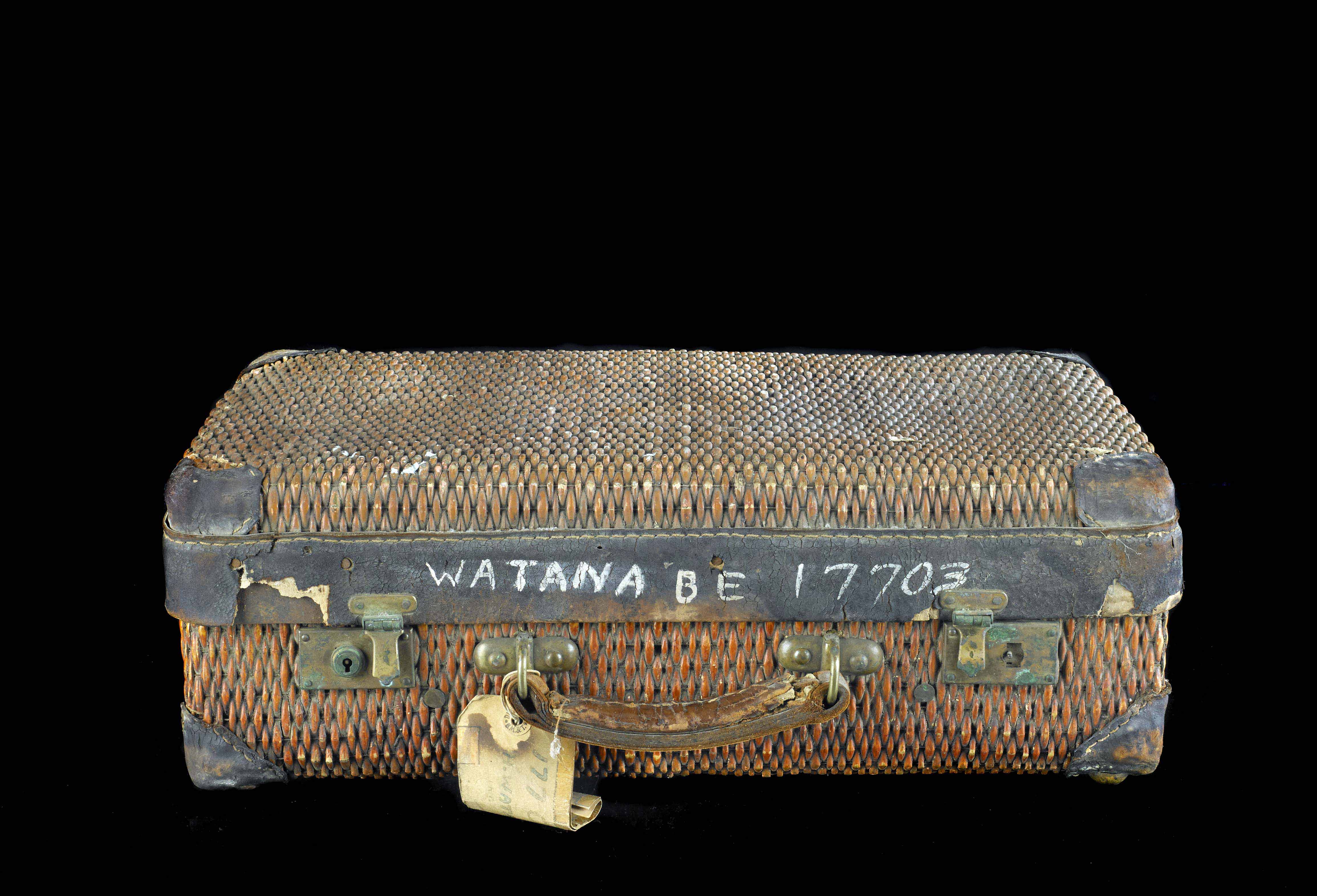 Brown Suitcase on black background